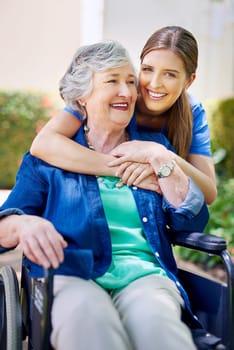 Theres a special bond beyond nurse and patient. a resident and a nurse outside in the retirement home garden.
