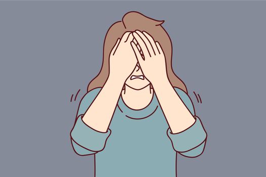 Depressed woman covers eyes with hands when she cries or sees something scary. Vector image