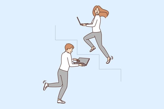 Motivated employees with laptops running upstairs