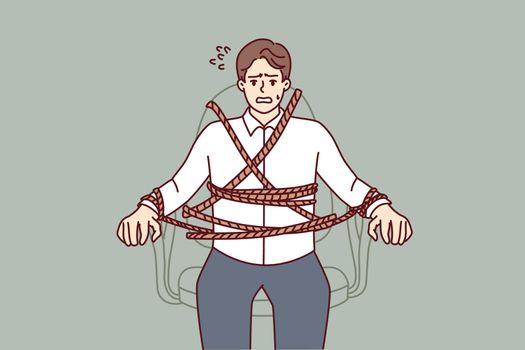 Business man is tied to office chair and feels fear due to strict deadlines. Vector image