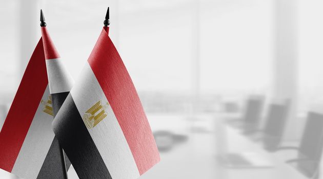 A small Egypt flag on an abstract blurry background