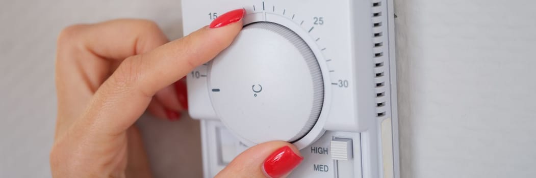 Manually adjust temperature in central heating control panel