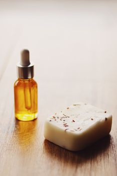 Oil serum bottle and natural herbal handmade soap, beauty and skincare product