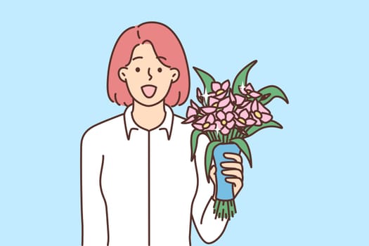 Smiling woman with bouquet greeting with anniversary