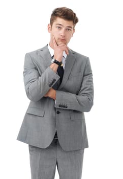 Business decisions arent always easy. A handsome young businessman isolated on white.