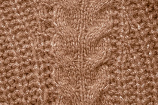 Organic knitting material with macro woven threads.