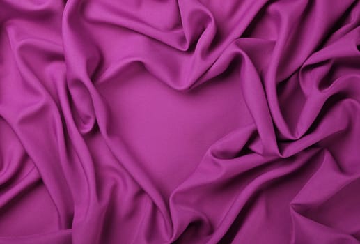 Pink heart shape textile fold pleats background