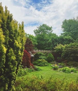 Ashridge House and gardens in summer, illustrative editorial