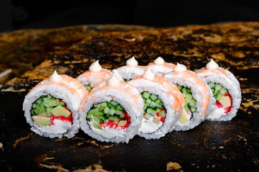 Delicious Sushi Roll on a stone Plate