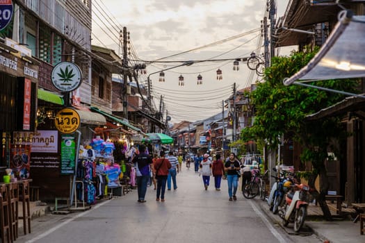 Chiang Khan village North Eastern Thailand February 2023 , A traditional village with wooden house in the evening at the walking street market of Chiang Khan