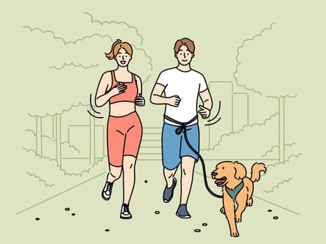 Happy couple jogging in park with dog