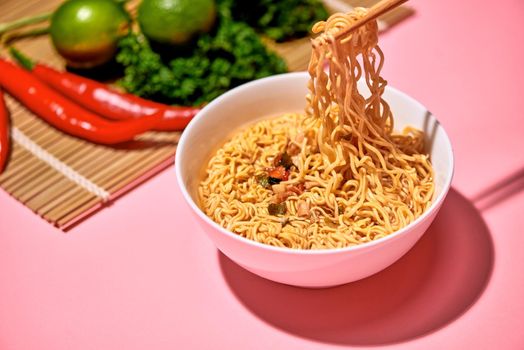 Traditional Asian instant noodles meal with vegetables