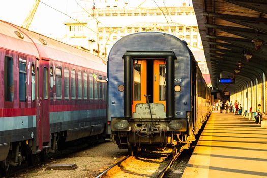 Detail of train in motion at train platform at Bucharest North Railway Station (Gara de Nord Bucharest) in Bucharest, Romania, 2020