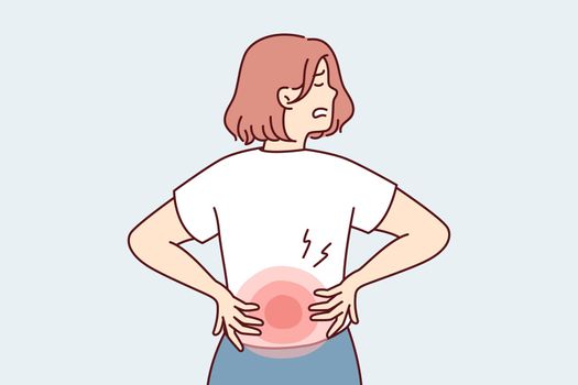 Woman holds on to red lower back after failing to lift heavy bag needs massage . Vector image