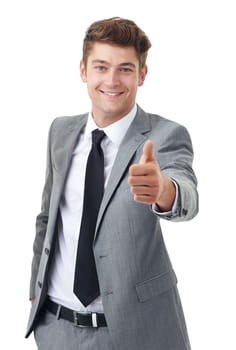 Thumbs up - Business success. A handsome young businessman isolated on white