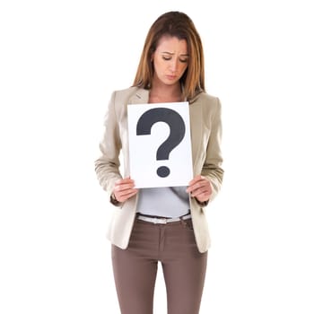 She has a burning question to ask. Studio shot of a young businesswoman holding a placard with a question mark on it.