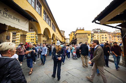October 11, 2018.Tuscany.ITALY.FLORENCE: Police and tourists on the Ponte Vecchio Bridge