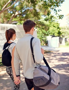 Committed to fitness and each other. a sporty young couple walking together before a workout.
