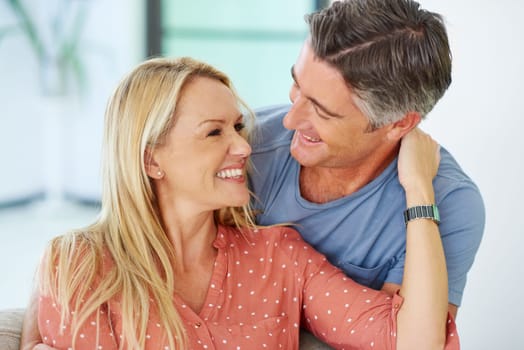 The importance of saying I love you. a mature couple being affectionate at home.