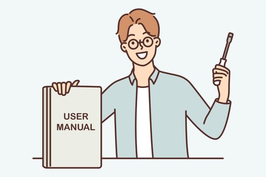 Guy with screwdriver shows book with inscription user manual recommending use educational literature