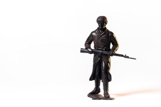 Vintage toy black soldier isolated on white background
