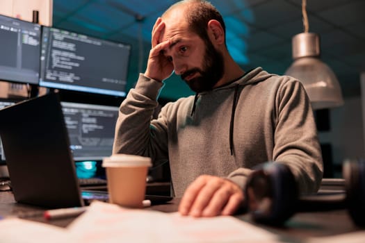 Stressed overworked developer programming html code