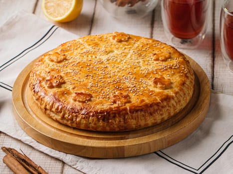 Baked pie with beef and pumpkin filling