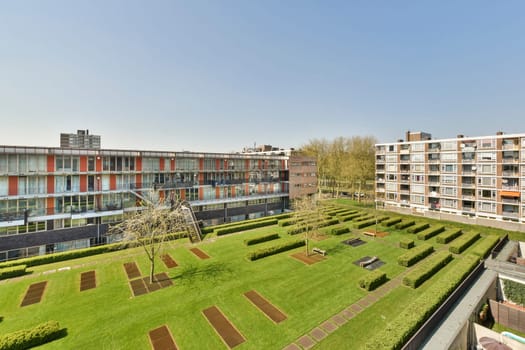 the green roof of a building with grass and trees