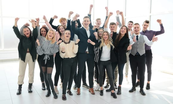 group of happy young business people celebrating together