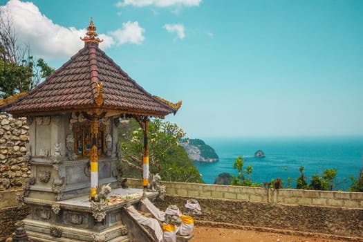 Religious building, traditional Balinese temple on the background of the ocean. Bali, Indonesia