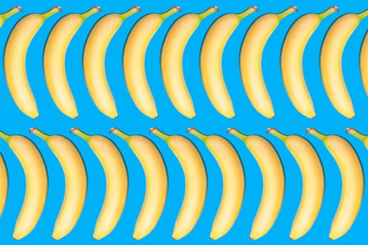 Yellow fresh banana on vivid blue background