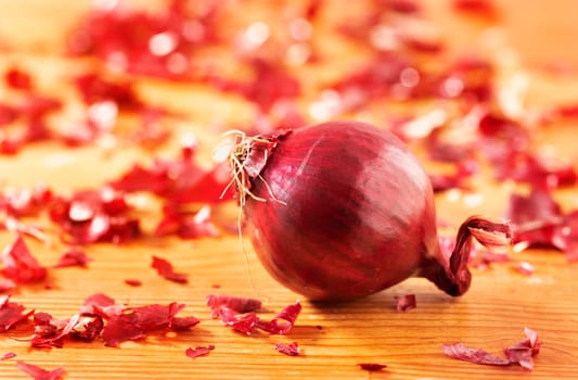 Red onion on table