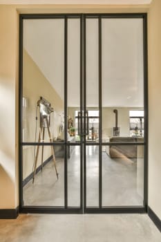 a room with a large glass door and a mirror