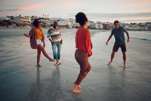 Water, feet and friends at a beach at sunset, celebrating their freedom and friendship while bonding in nature. Travel, fun and diverse people laughing and being silly together in Los Angeles ocean