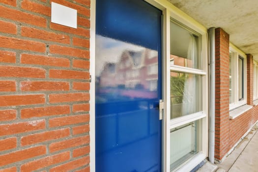 the front door of a house with a blue door