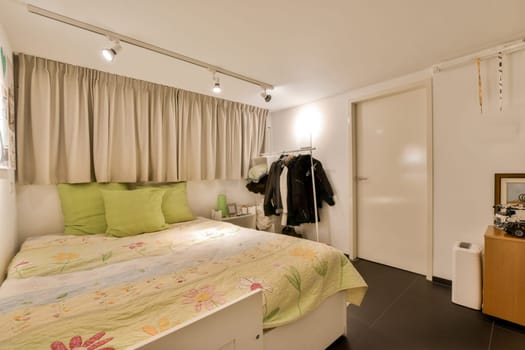 a bedroom with a bed and a closet