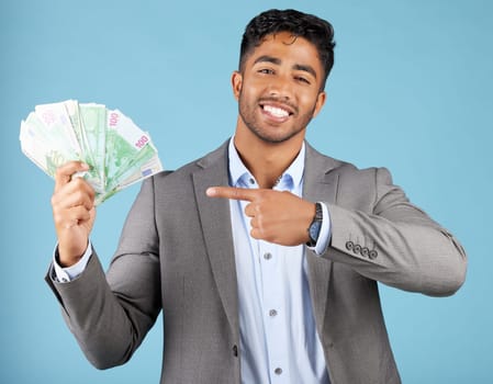 Man, cash and hand in portrait at studio for winning, success and profit with smile, prize or investment, Happy businessman, money and winner with happiness, rich or celebration from betting game