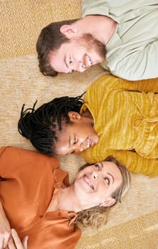 Relax, floor and adoption family top view of house leisure with smile, happiness and care of parents. Interracial, mother and dad with young black child rest together on comfortable home carpet.
