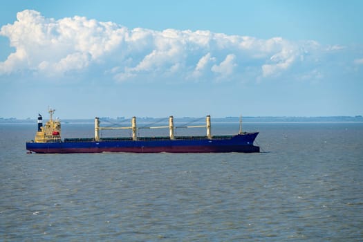General cargo and bulk carrier ship at anchor off the coast of Argentina