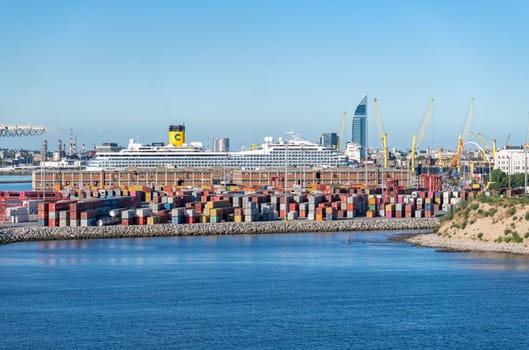 Montevideo, Uruguay - 5 February 2023: Costa cruise ship with thousands of shipping containers