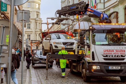 11 November 2022 Prague, Czech Republic. Cars taken away by tow truck improper parking in city centr