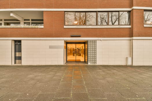 the entrance to a building with a orange door