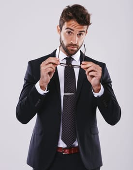 Stylish business. Studio shot of a handsome and well-dressed young man.