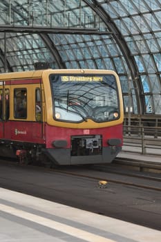 Vertical shot of the Berlin light rail S7 leaving the Berlin main station