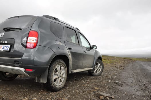 Grey Dacia Duster on one of Iceland's F-roads on a cloudy day