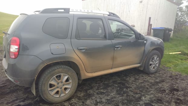 Dirty Dacia Duster car after off-road ride in Iceland