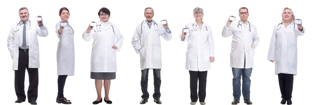full length group of doctors showing badge isolated