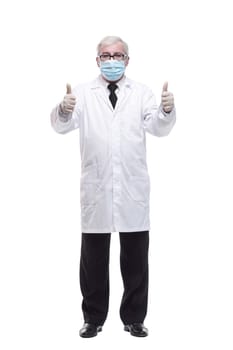 full-length. mature doctor in protective mask and gloves .
