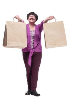 full-length. casual elderly woman with shopping bags.