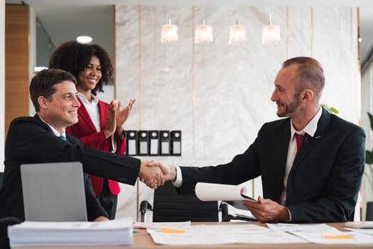 business holding hands, businessmen are agreeing on business together and shaking hands after a successful negotiation. Handshaking is a or congratulation
